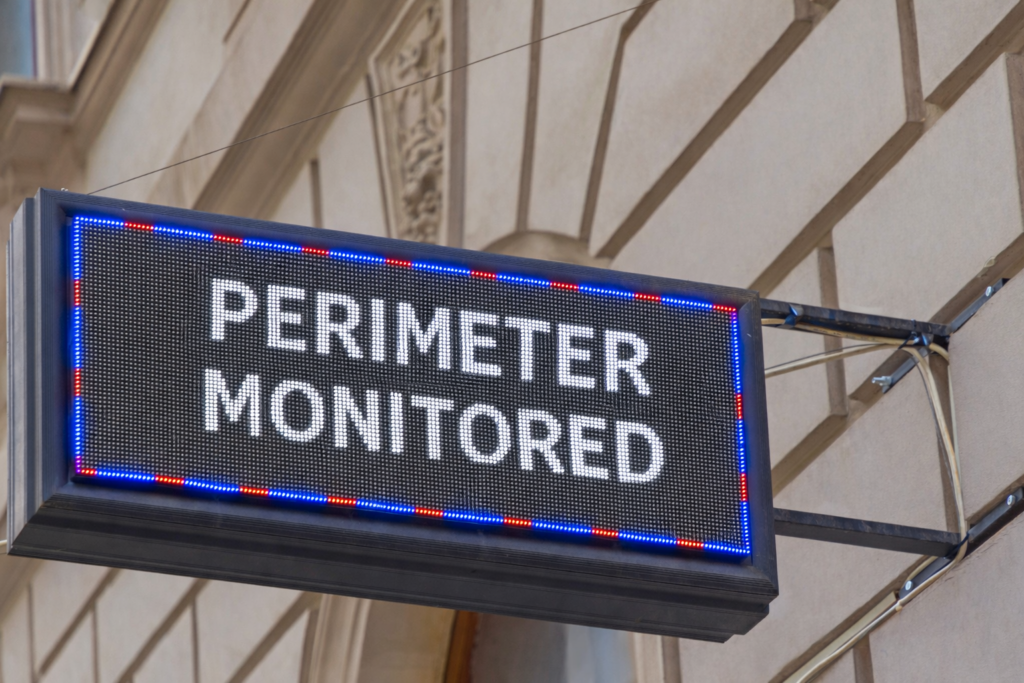 LED Display showing the perimeter is bring monitored mounted on the side of a building.